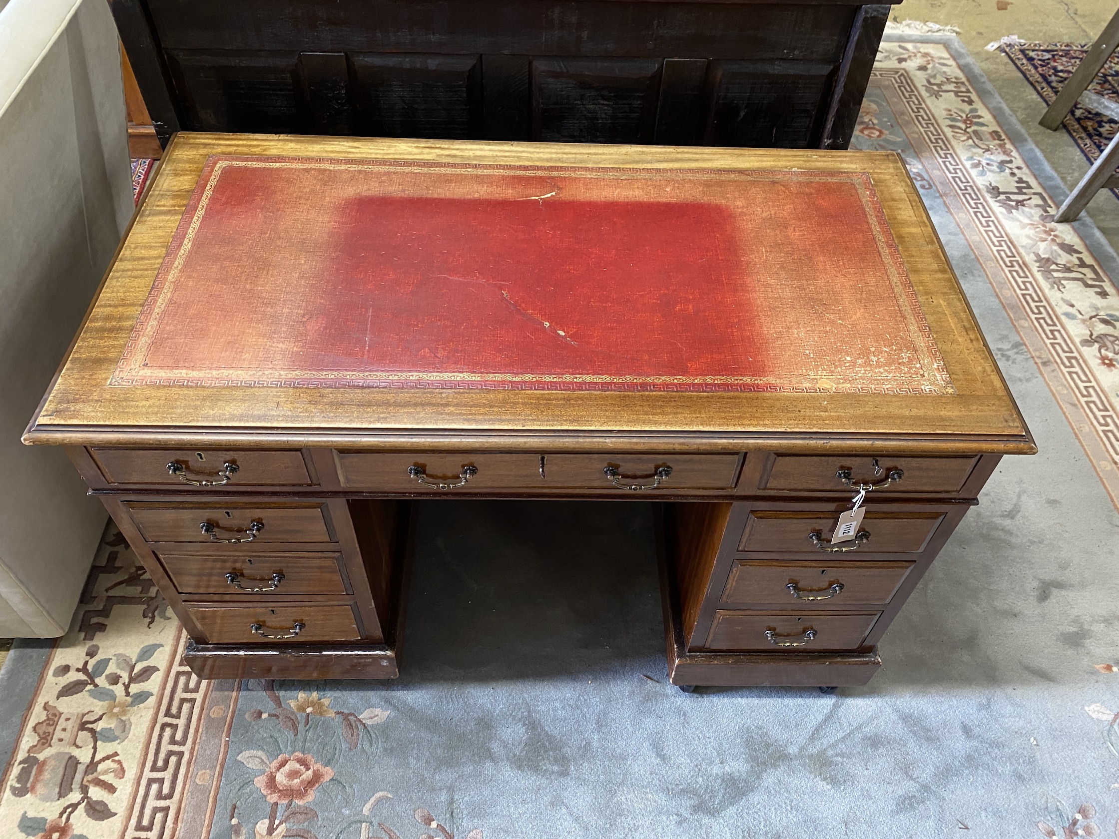 An early 20th century mahogany pedestal desk, width 122cm, depth 65cm, height 76cm